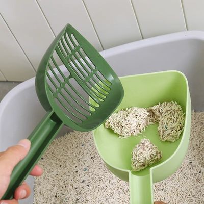 Продукт туалета для кошек Пластиковая какашка подбирает мусор Какашка для собак Какашка для собак Уборные инструменты